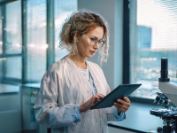 A researcher works on a tablet in the labor.