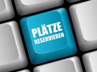 Computertastatur mit Taste "Plätze reservieren"
