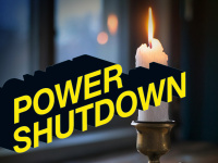 brennende Kerze mit dem Schriftzug Powershutdown
