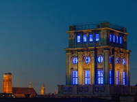 TUM clock tower at night