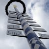 Maypole in the inner courtyard of the TUM main campus with faculty logos