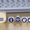 Keyboard and wooden cubes with the inscription "Get Published" 