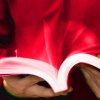 Man scrolling through a book