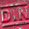 DIN writing as metal embossing