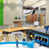 Miniature figures of craftsmen with LAN cable and switch on the circulation desk at the Branch Library Chemistry